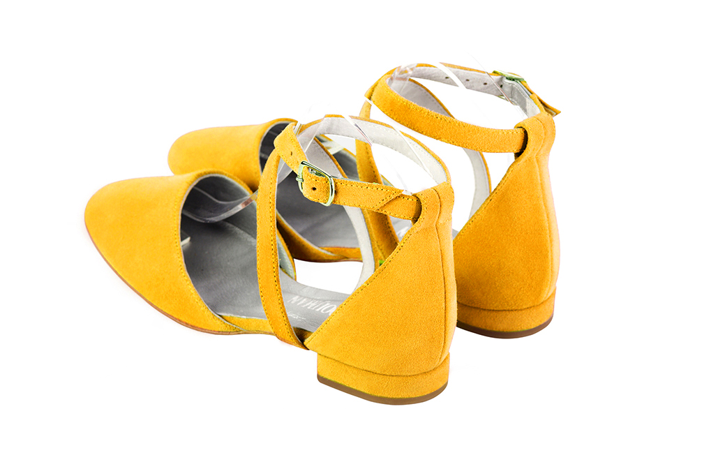 Yellow women's ballet pumps, with flat heels. Round toe. Flat block heels. Rear view - Florence KOOIJMAN